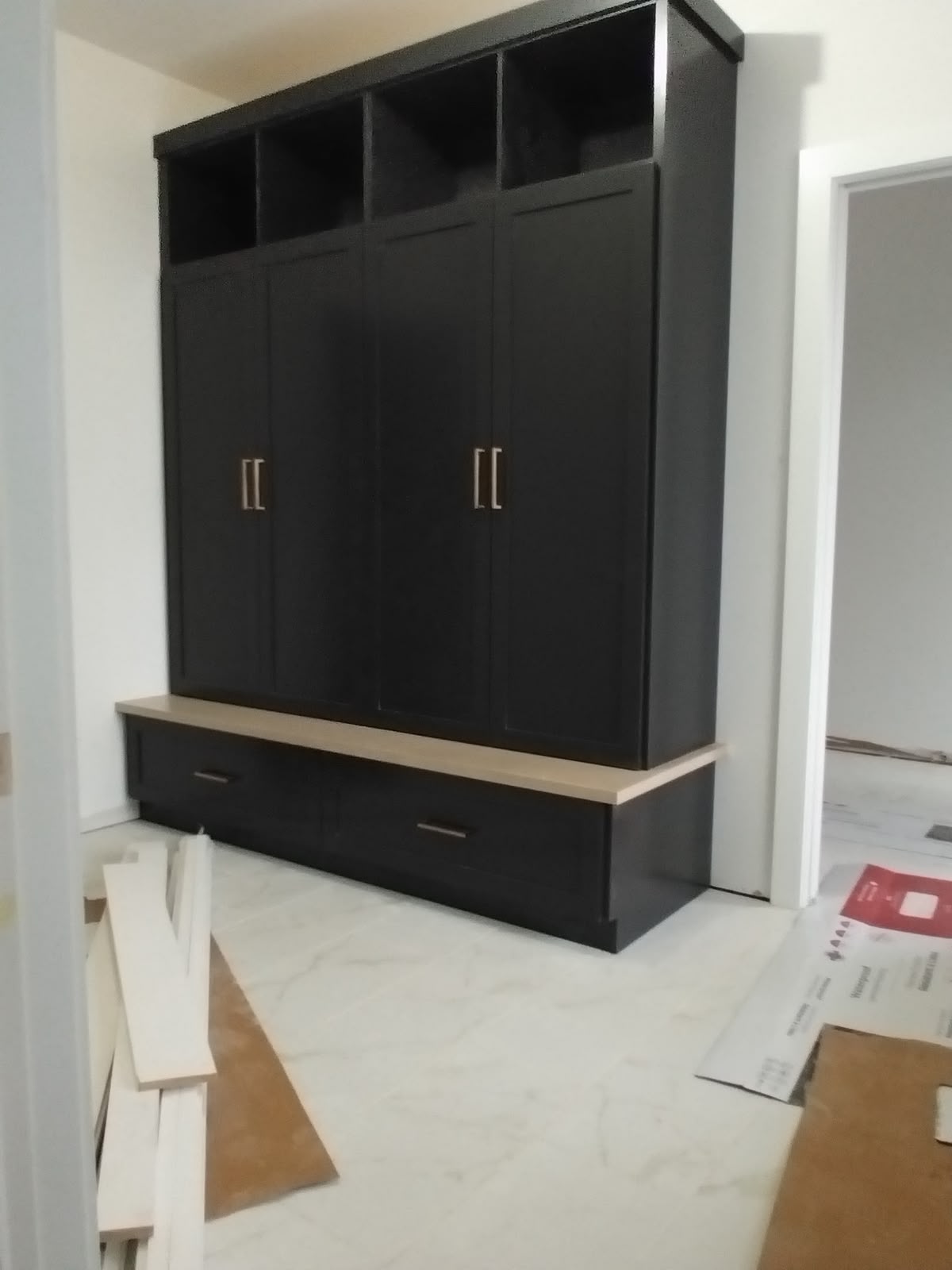 Custom storage cabinetry by StairTrim Design